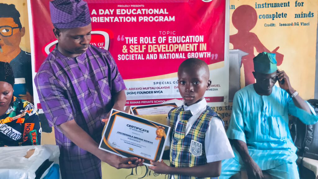 Award Certificate of Academic Excellence was presented by NCYA to Aregbeshola Opeyemi Ridwan, other recipents includes: Bada Abdul-Salam Ayomide, Ololade Precious Adetolani and Oseni Mariam at NCYA Educational Orientation 2023